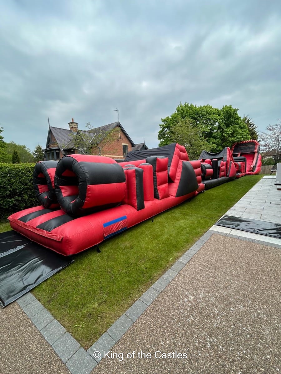 Ultimate 100ft Assault Course with 12ft Slide - Bouncy Castle Hire ...
